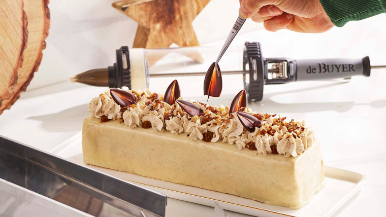 Almond log cake with caramel, tonka bean, and vanilla